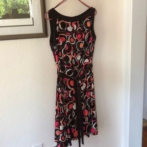 Cute, flirty dress, size 10 by Sandra Darren.